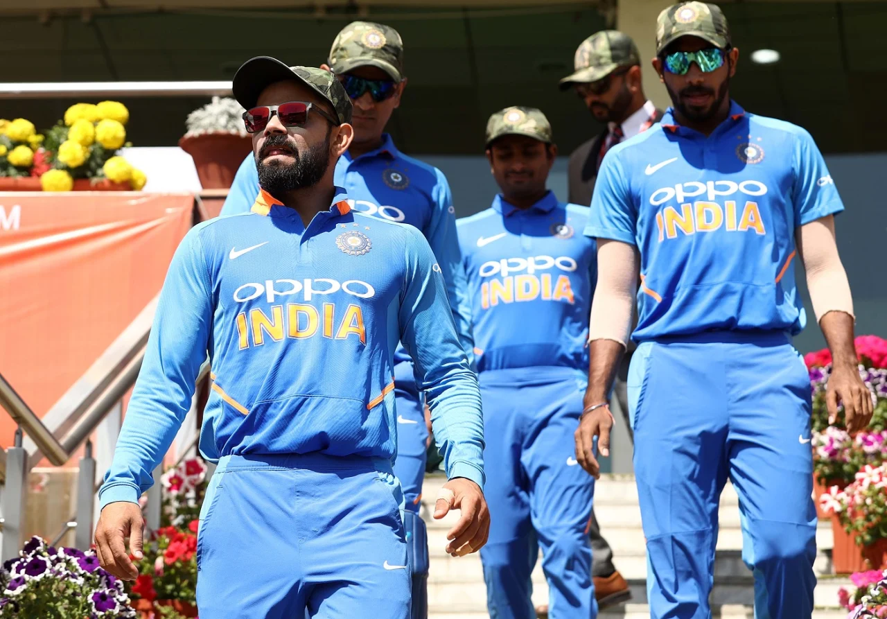 The Indian team walked out to field wearing army camouflage caps, presented ahead of the game by MS Dhoni 
copyright - Getty Images
